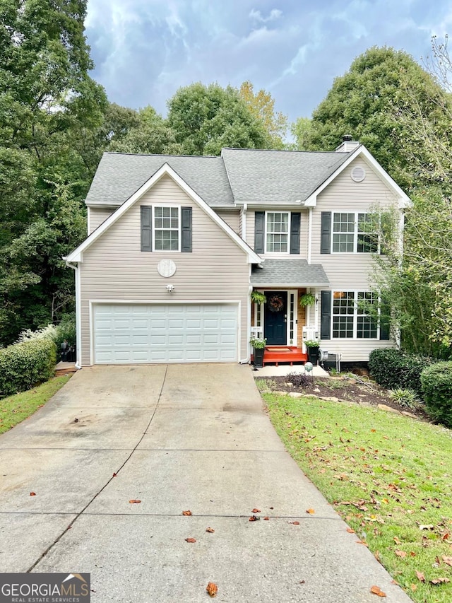 view of front property with a garage