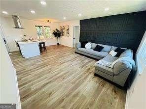 living room with hardwood / wood-style flooring