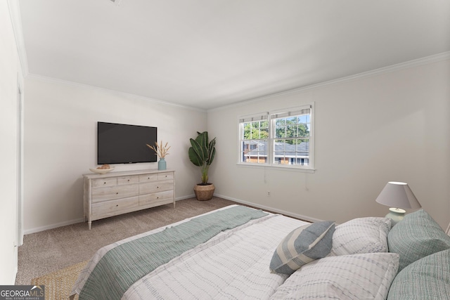 bedroom featuring ornamental molding and light colored carpet