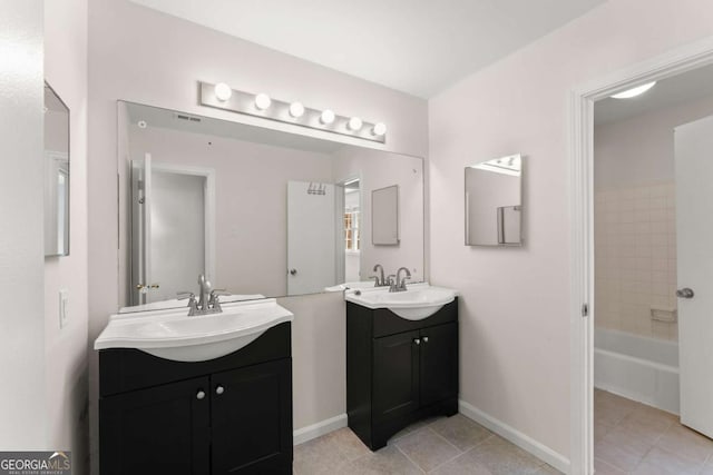 bathroom with vanity, tile patterned flooring, and tub / shower combination