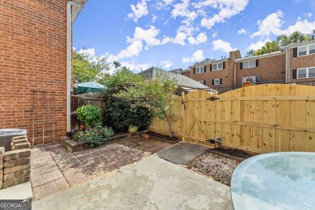 view of patio featuring central AC