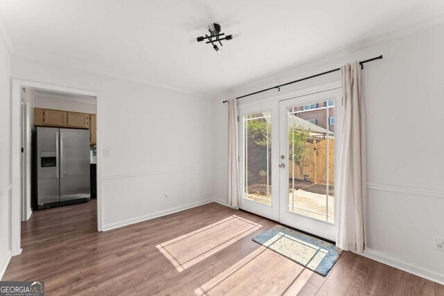 empty room featuring dark hardwood / wood-style flooring