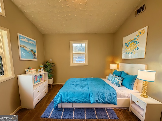 bedroom featuring a textured ceiling