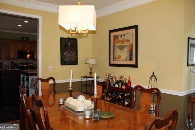 dining room with crown molding