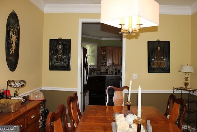 dining room with ornamental molding