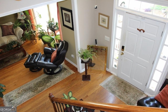 entryway with light hardwood / wood-style flooring