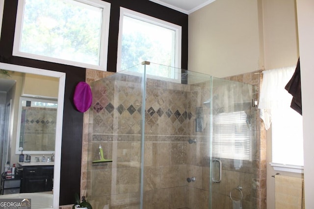 bathroom featuring a shower with door