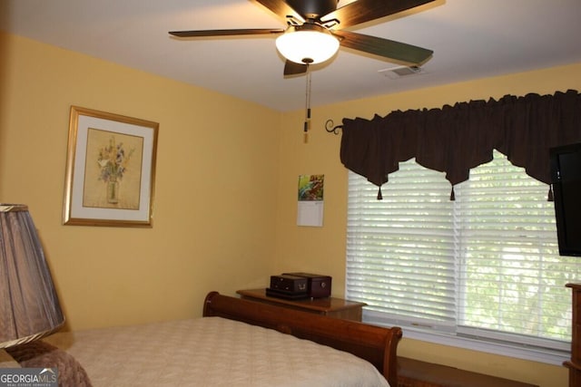 bedroom featuring ceiling fan