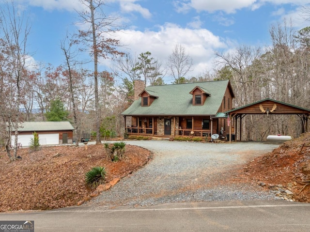 view of front of house with a carport and covered porch