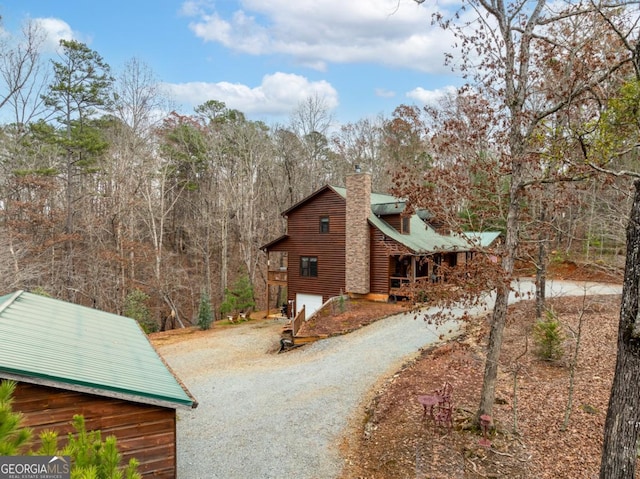 view of property exterior with a garage