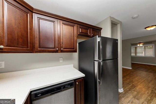 kitchen featuring dark brown cabinetry, stainless steel appliances, ceiling fan, and light hardwood / wood-style floors