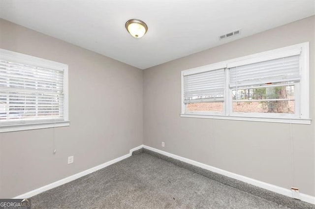 view of carpeted spare room