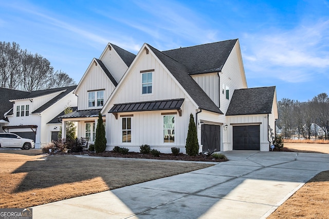 modern inspired farmhouse featuring a garage