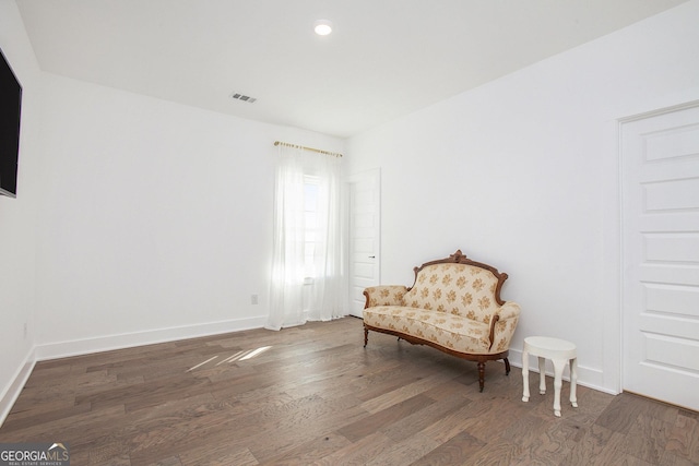 living area featuring dark hardwood / wood-style flooring