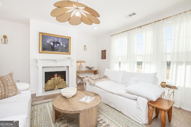 living room with light hardwood / wood-style floors