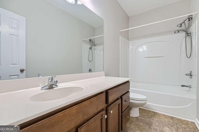 full bathroom with bathtub / shower combination, vanity, and toilet