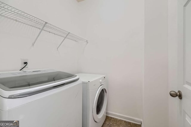 laundry area featuring washer and clothes dryer