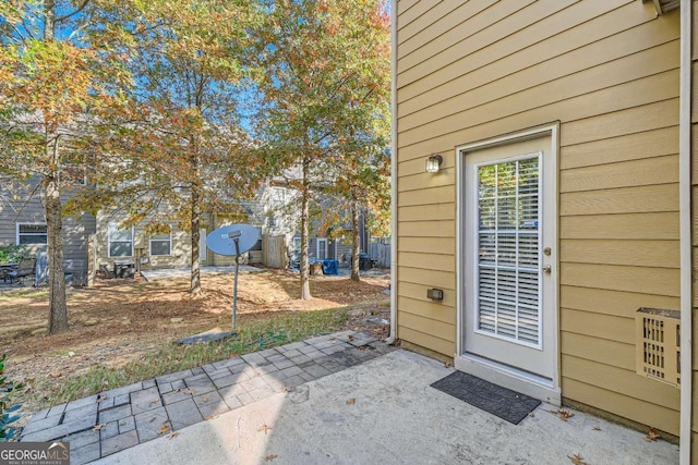 doorway to property featuring a patio area