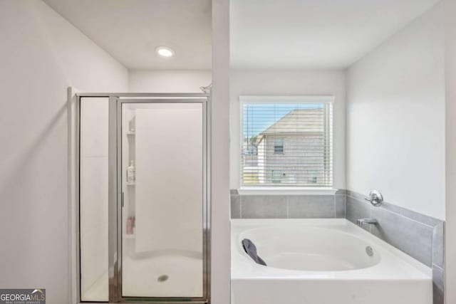 bathroom with independent shower and bath