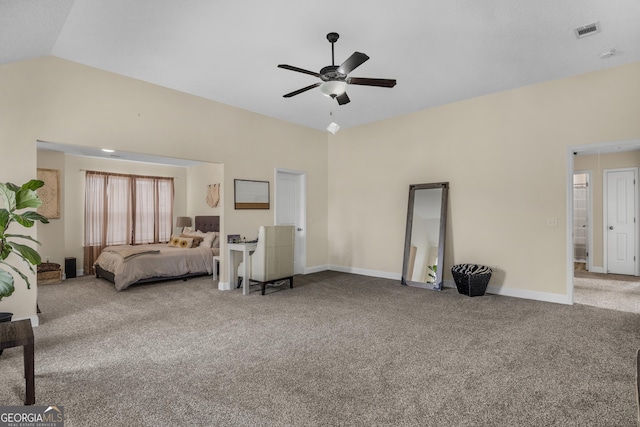 carpeted bedroom with ceiling fan and lofted ceiling