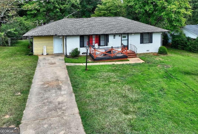 ranch-style home with a front yard