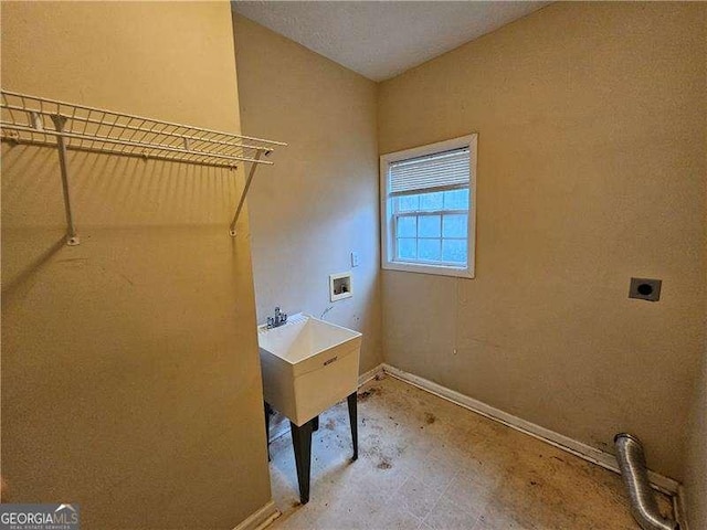 laundry area featuring hookup for an electric dryer and hookup for a washing machine