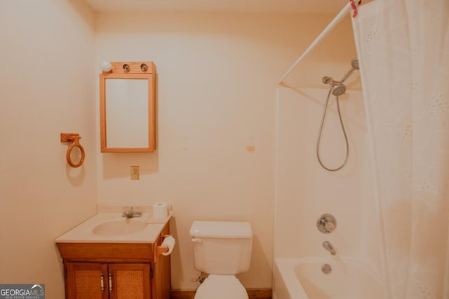 full bathroom featuring vanity, toilet, and shower / tub combo with curtain