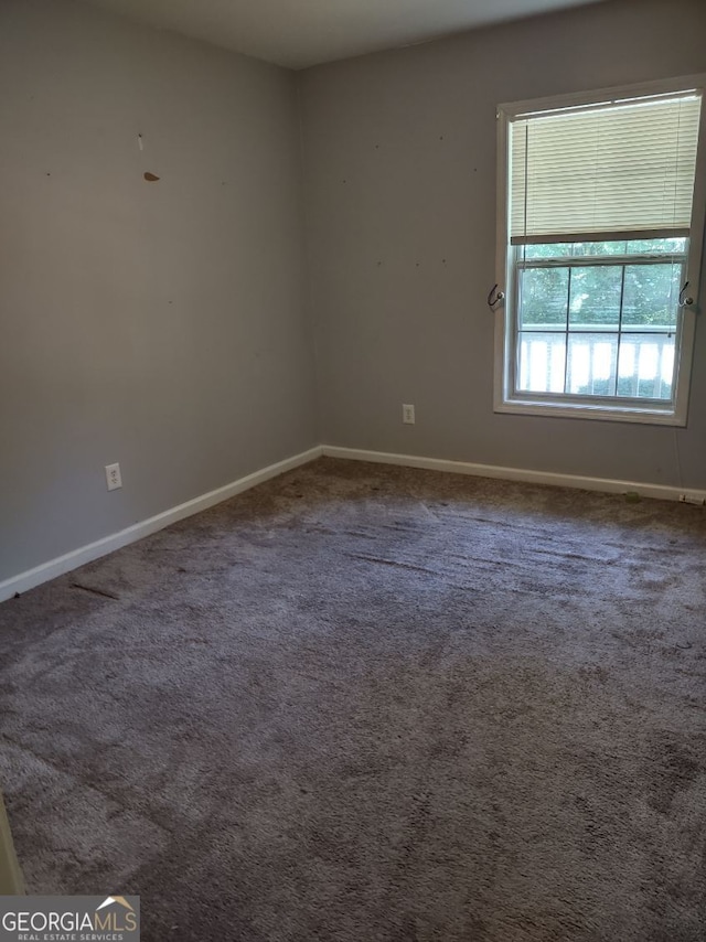 view of carpeted spare room