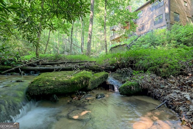 view of property's community with a water view