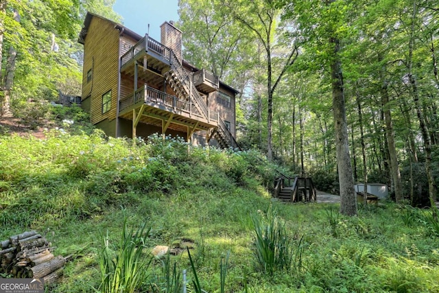 rear view of house with a deck