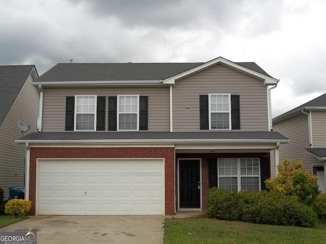 front of property featuring a garage