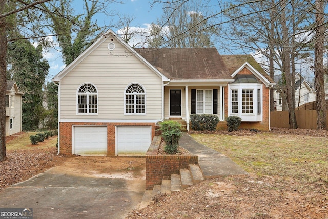 view of front of property with a garage