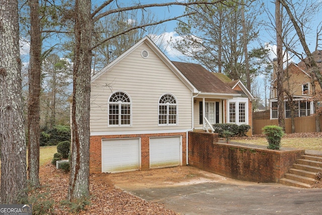 view of front of property with a garage