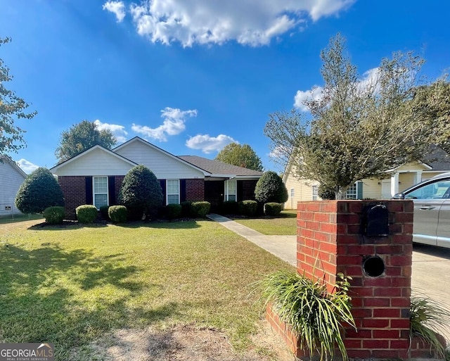 view of front of home with a front yard