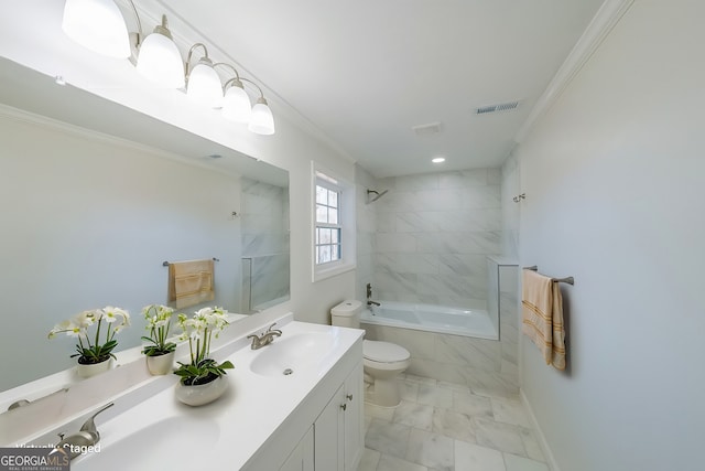 full bathroom with toilet, ornamental molding, tiled shower / bath, and vanity