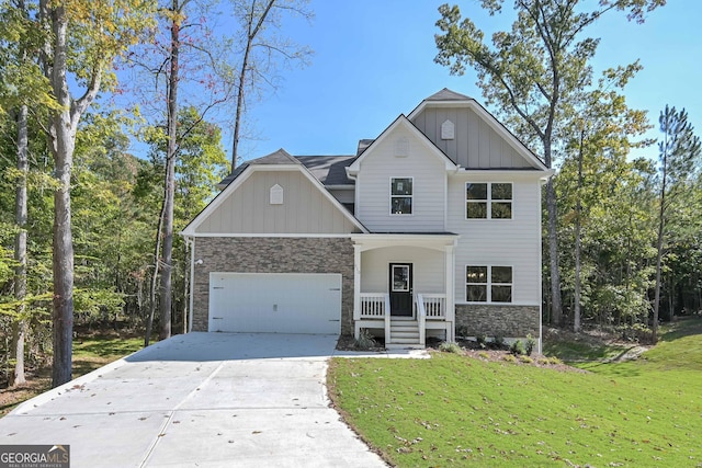 view of front of house with covered porch and a front yard