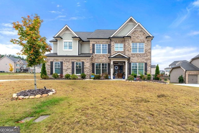 craftsman house with a front lawn