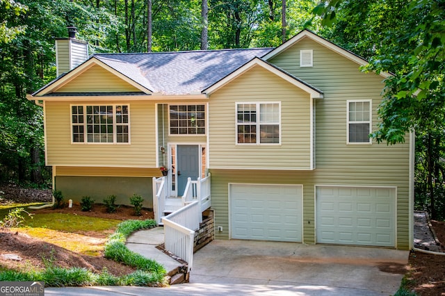 bi-level home featuring a garage