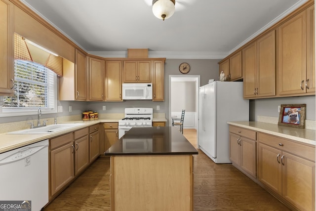 kitchen with sink, crown molding, white appliances, a kitchen island, and light wood-type flooring