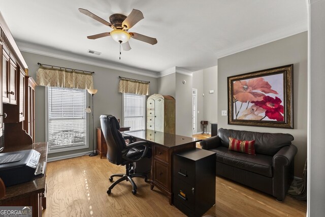 2352 Kelman Pl, Dacula, GA 30019 - home office featuring a ceiling fan, wood finished floors, and ornamental molding