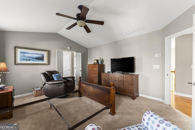 living room with lofted ceiling, light carpet, and ceiling fan