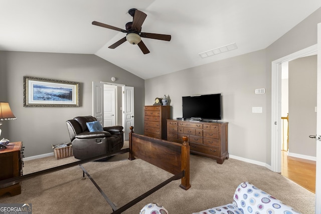 2352 Kelman Pl, Dacula, GA 30019 - carpeted bedroom featuring lofted ceiling, baseboards, and a ceiling fan