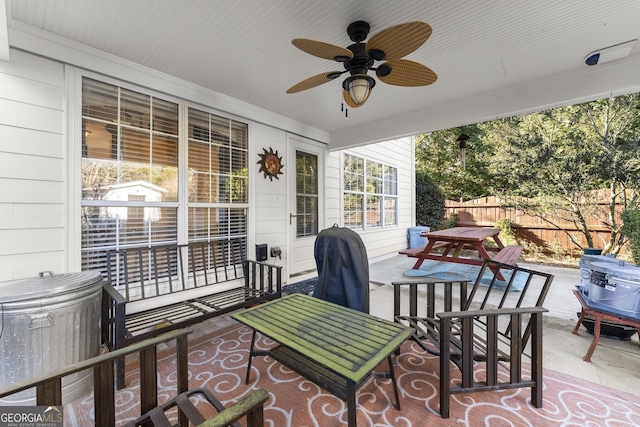 view of patio / terrace with ceiling fan and a porch