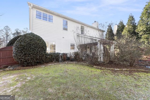 2352 Kelman Pl, Dacula, GA 30019 - rear view of property with a chimney