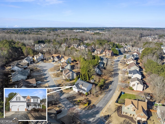 2352 Kelman Pl, Dacula, GA 30019 - aerial perspective of suburban area featuring a forest