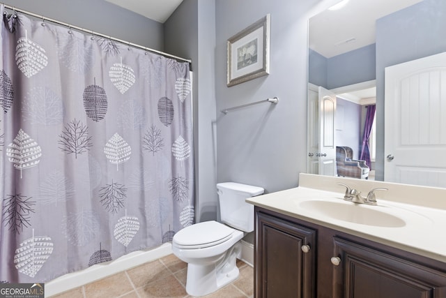 bathroom with a shower with shower curtain, vanity, and toilet