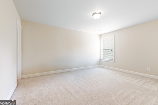 view of carpeted spare room