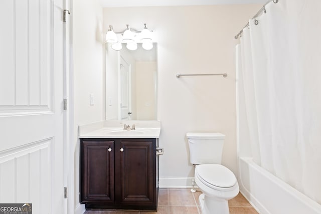 full bathroom featuring tile patterned flooring, vanity, toilet, and shower / tub combo with curtain