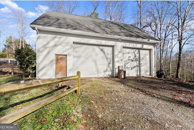 view of outbuilding featuring a garage