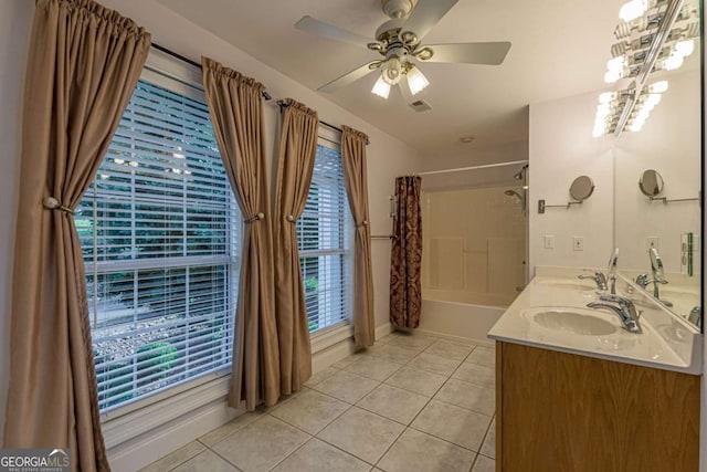 bathroom featuring vanity, tile patterned floors, ceiling fan, and shower / tub combo with curtain